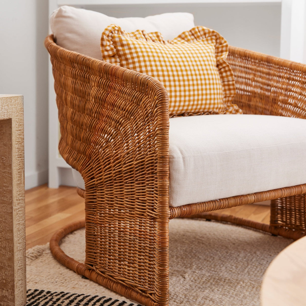 Curved Rattan Lounge Chair with Linen Cushion