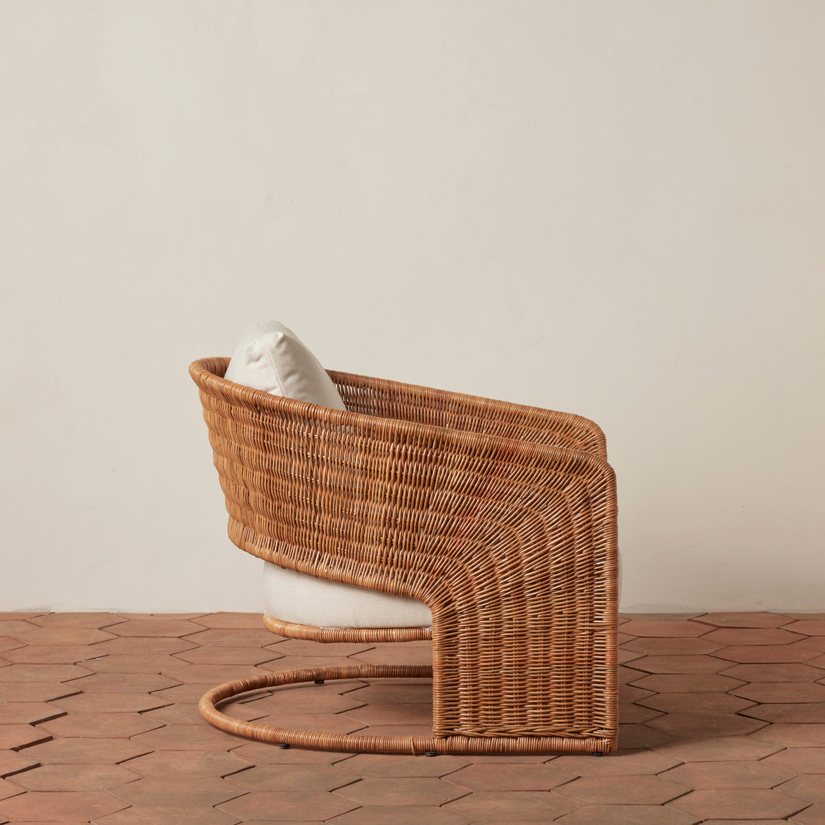 Curved Rattan Lounge Chair with Linen Cushion