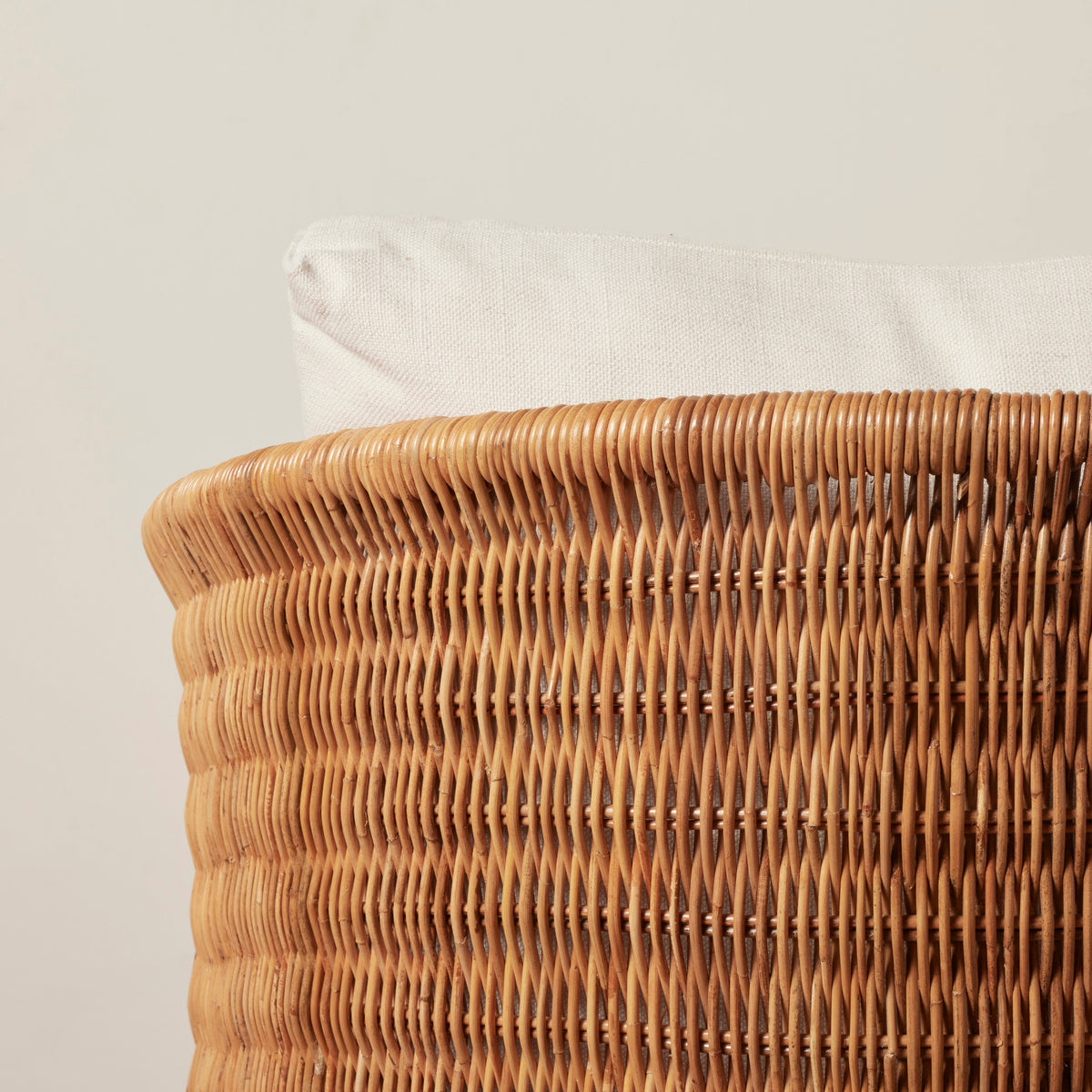 Curved Rattan Lounge Chair with Linen Cushion